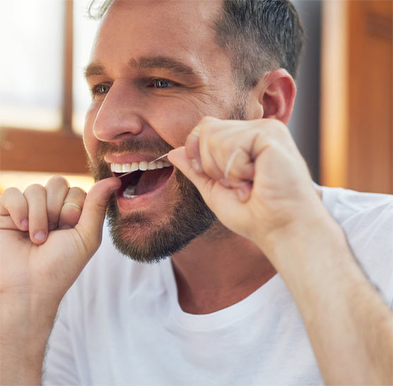 Man flossing